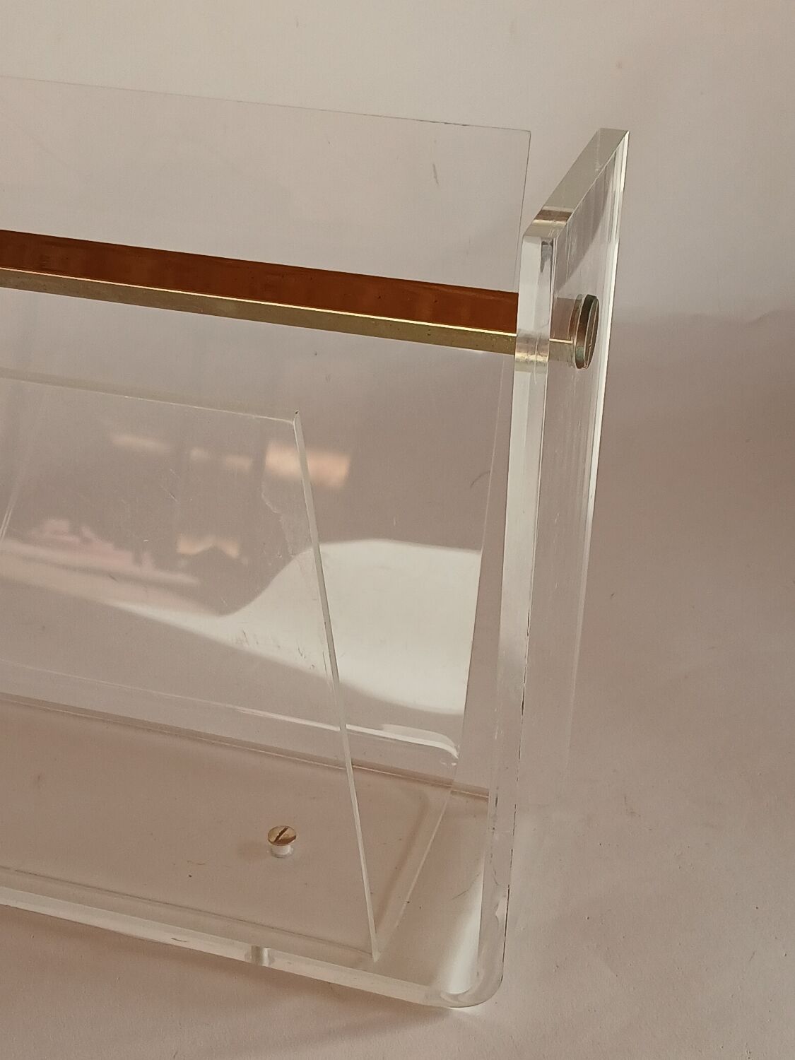 Acrylic magazine rack by David Lange