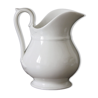 Old broc pitcher in white porcelain of the nineteenth century