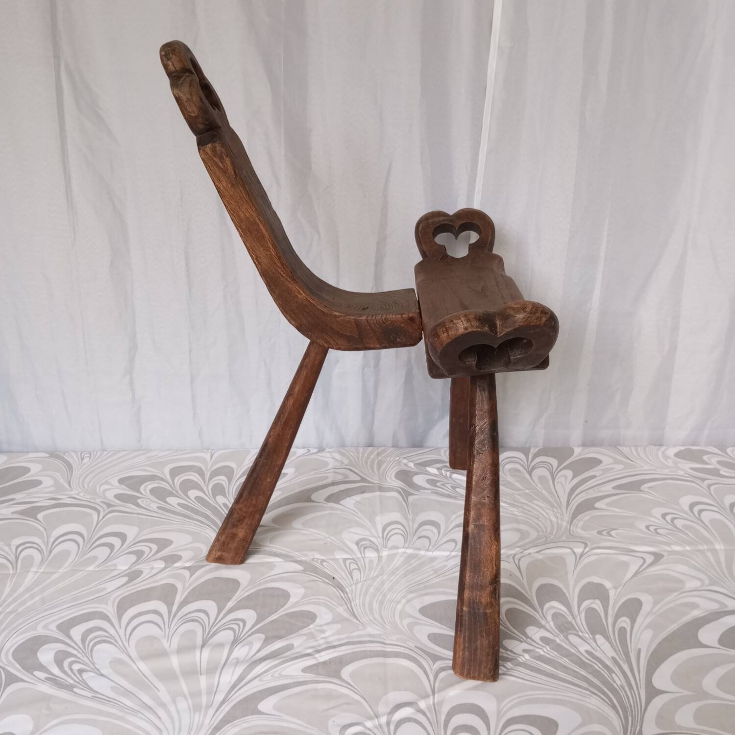 Brutalist tripod chairs in solid wood