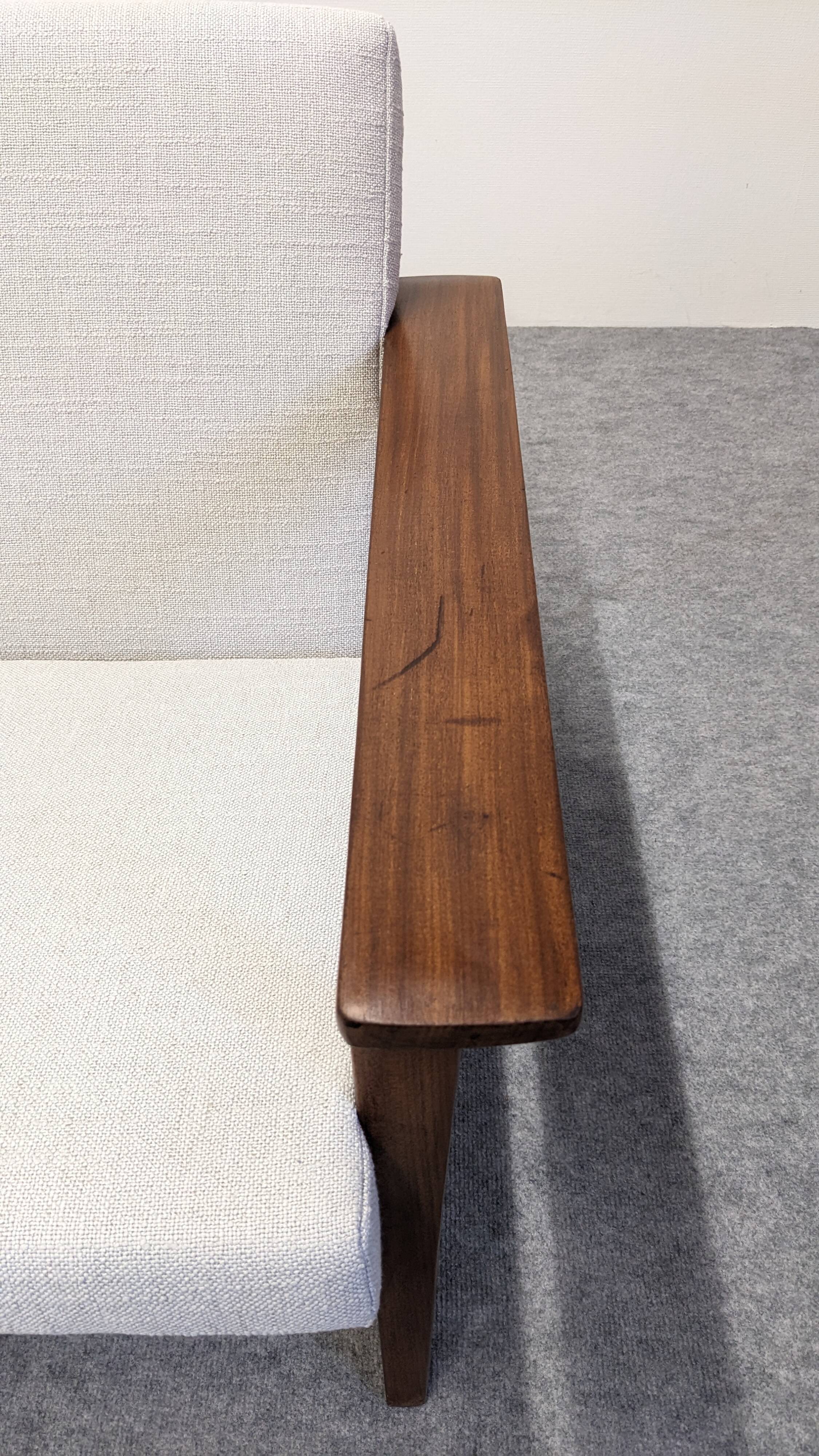 Scandinavian style three-seater sofa in teak, France circa 1950.