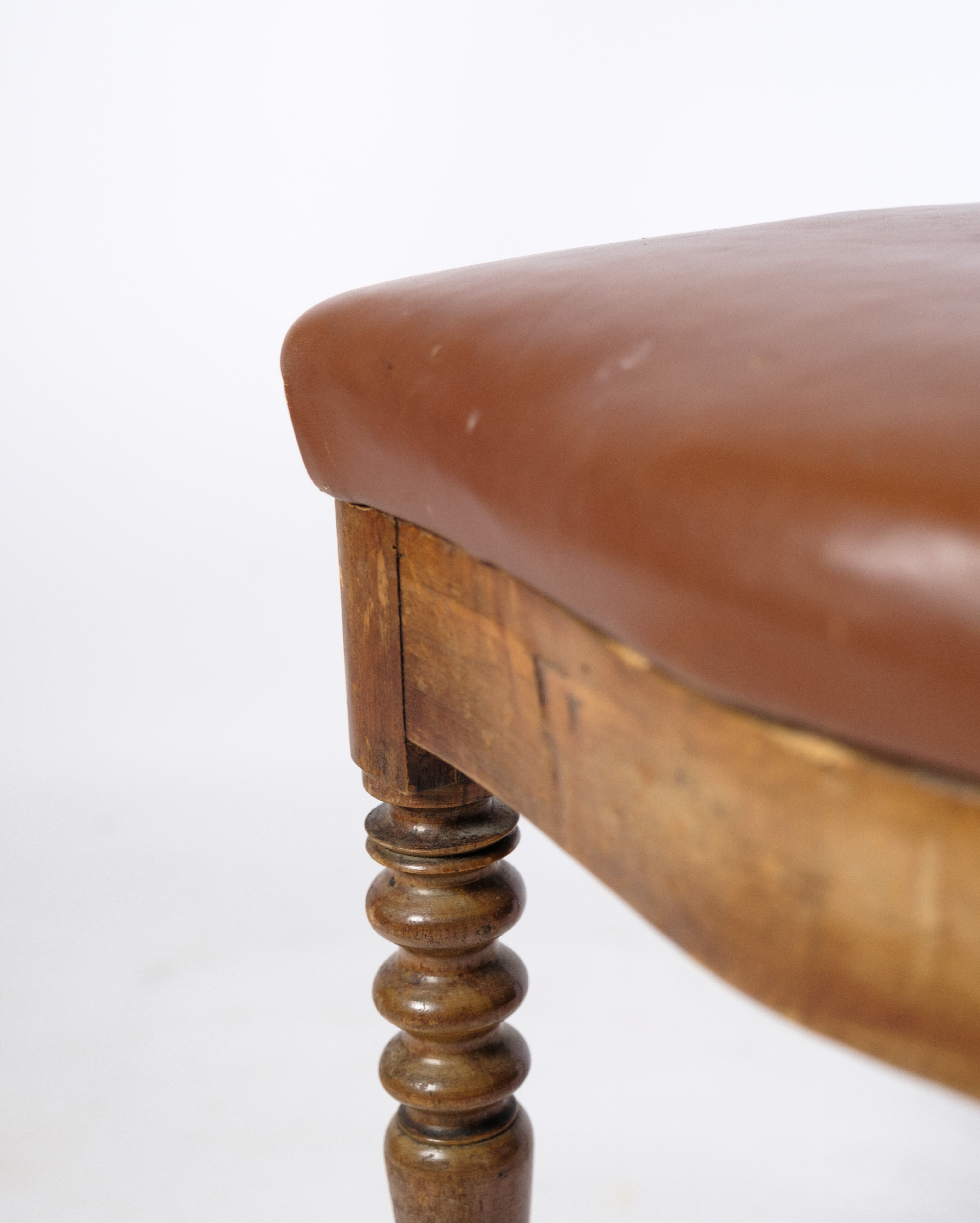 Set of eight late empire chairs in high quality brown leather in mahogany