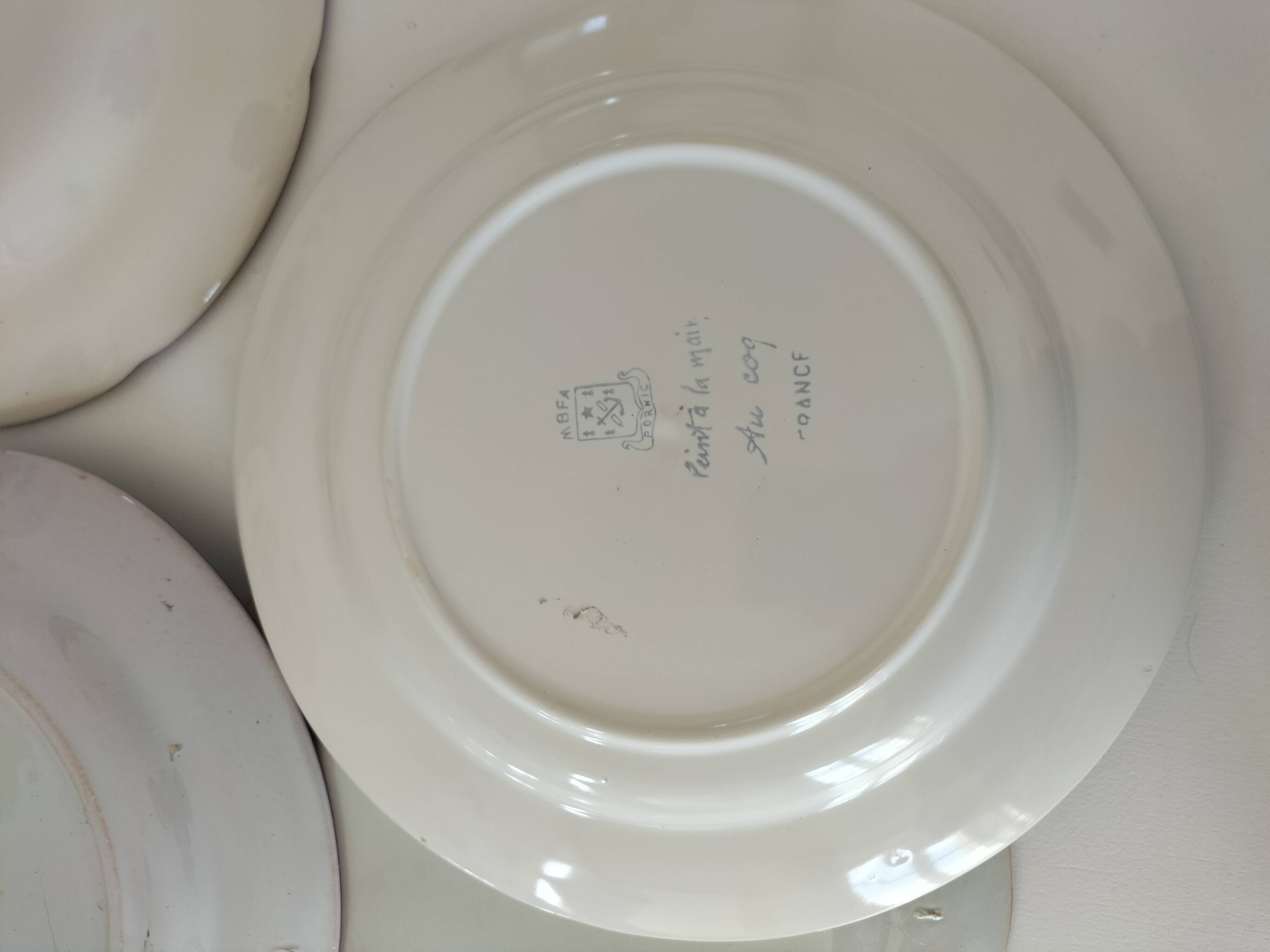 Set of 6 plates with birds and roosters.