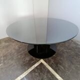 Black lacquered glass table and glass in the hoof style, Italy.