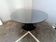Black lacquered glass table and glass in the hoof style, Italy.