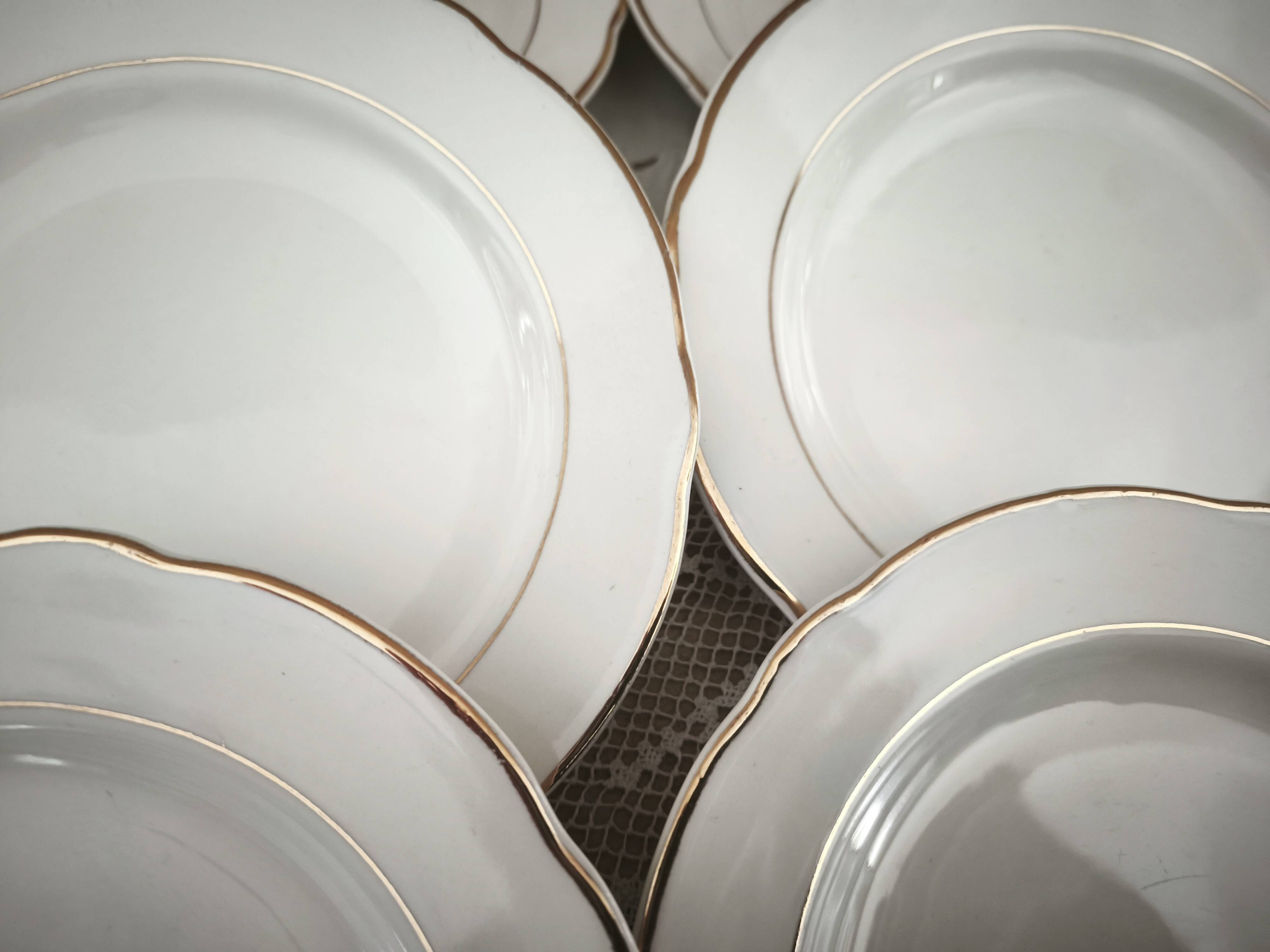 Set of 12 white earthenware dessert plates with a gold rim from Sarreguemines.