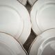 Set of 12 white earthenware dessert plates with a gold rim from Sarreguemines.