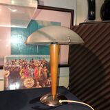 Table lamp legs chrome wood lampshade opaque glass.