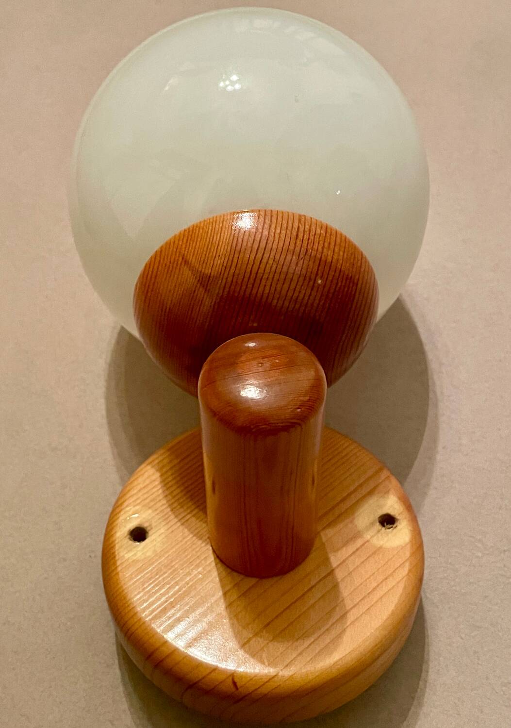 Vintage white glass wall light and pin.