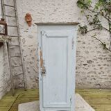 Old patinated bonnet maker