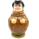 Monk-shaped slurry pitcher