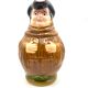 Monk-shaped slurry pitcher