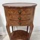Pair of small kidney-shaped commodes in marquetry veneer, 20th century.