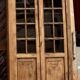 Antique glass-fronted cabinet in raw solid oak: display cabinet bookshelf.