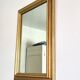 Miroir ancien en bois doré et cuivré