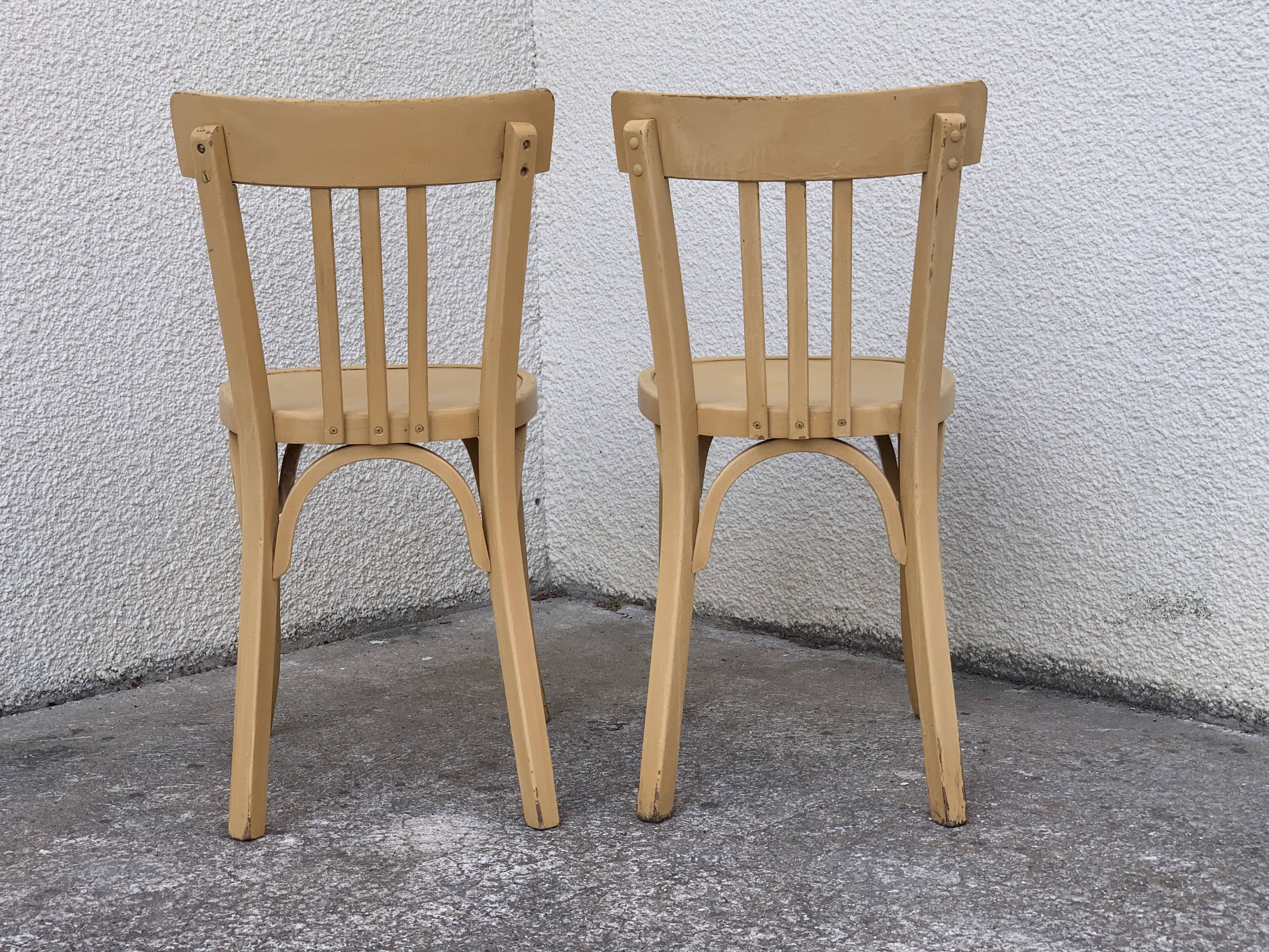 Paire de chaises bistrot Baumann patine vintage