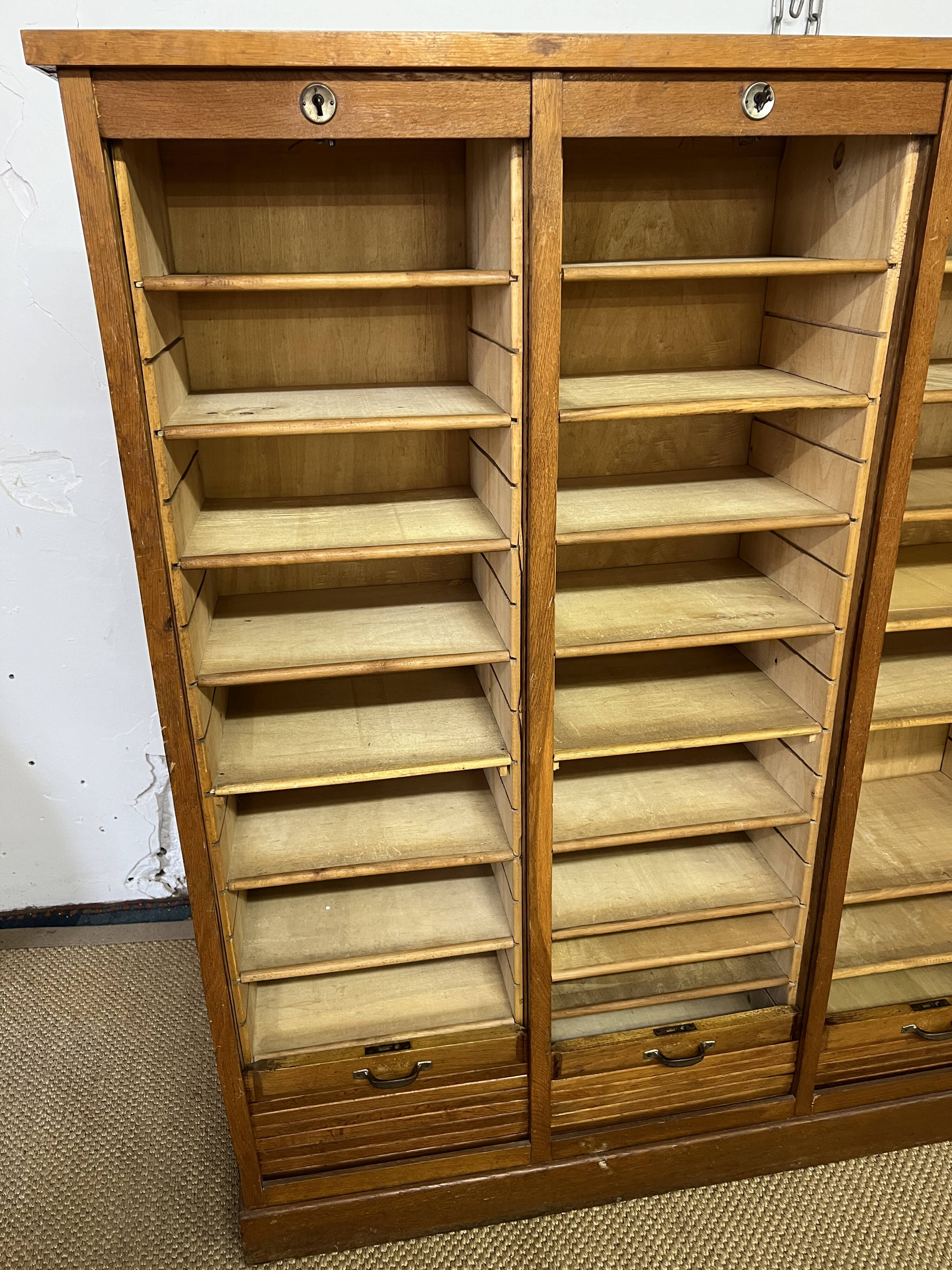Old filing cabinet with triple curtains