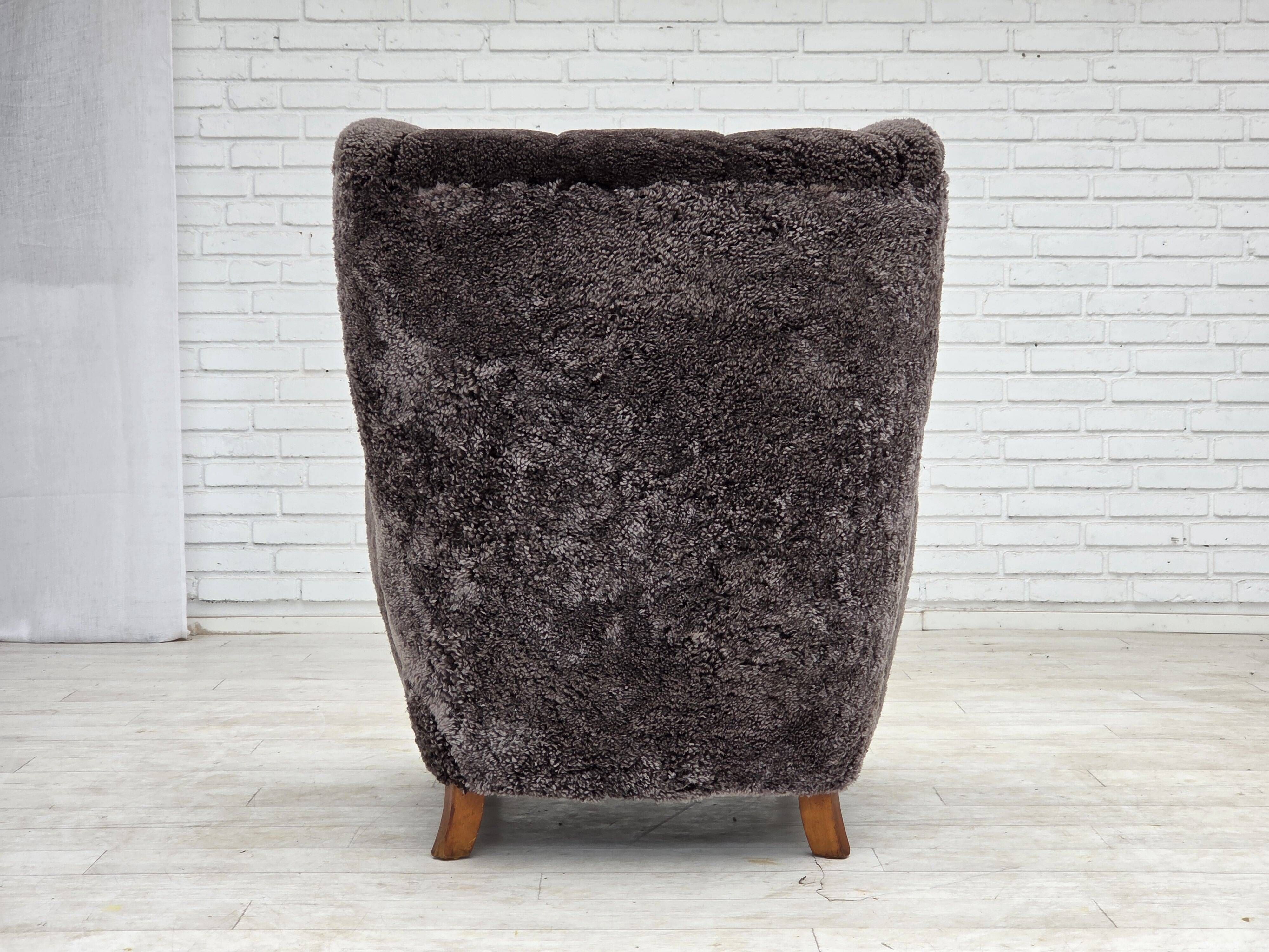 1960s, Danish design, reupholstered armchair, genuine sheepskin.