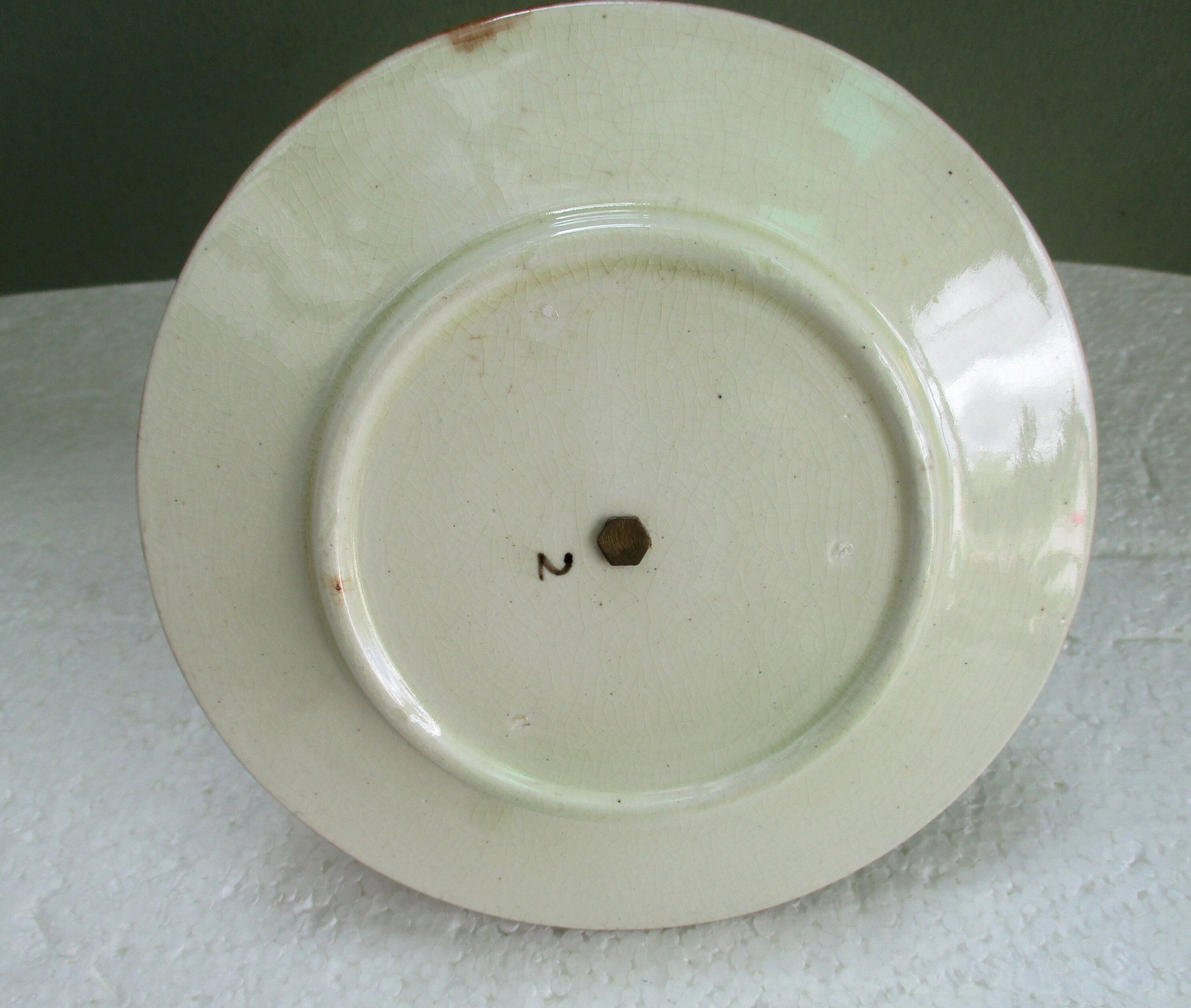 Presentation plate, barbotine and gilded brass