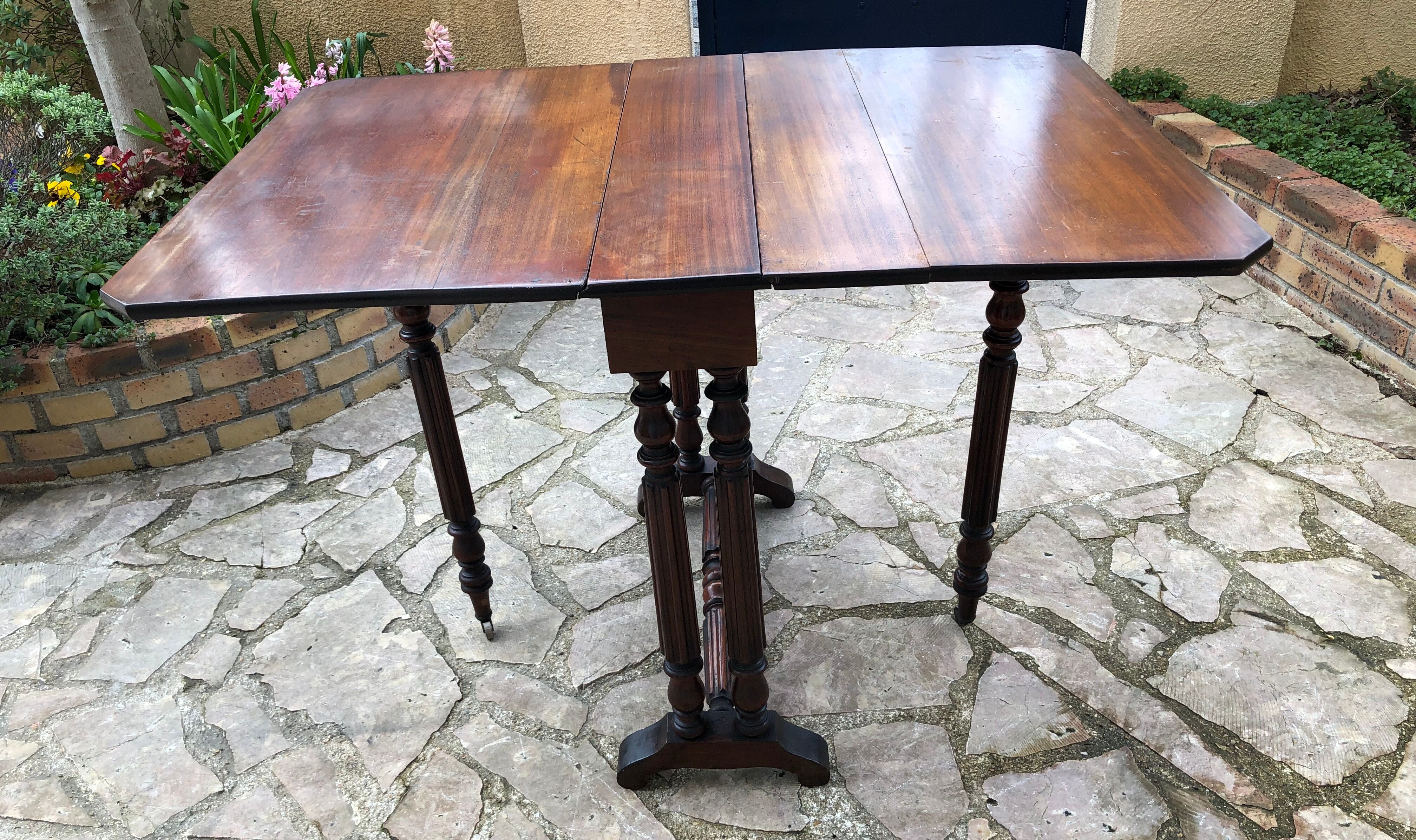 Side table with flaps