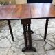 Side table with flaps