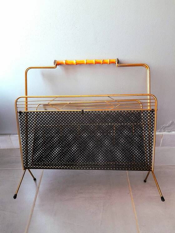 Perforated metal magazine rack, 1950