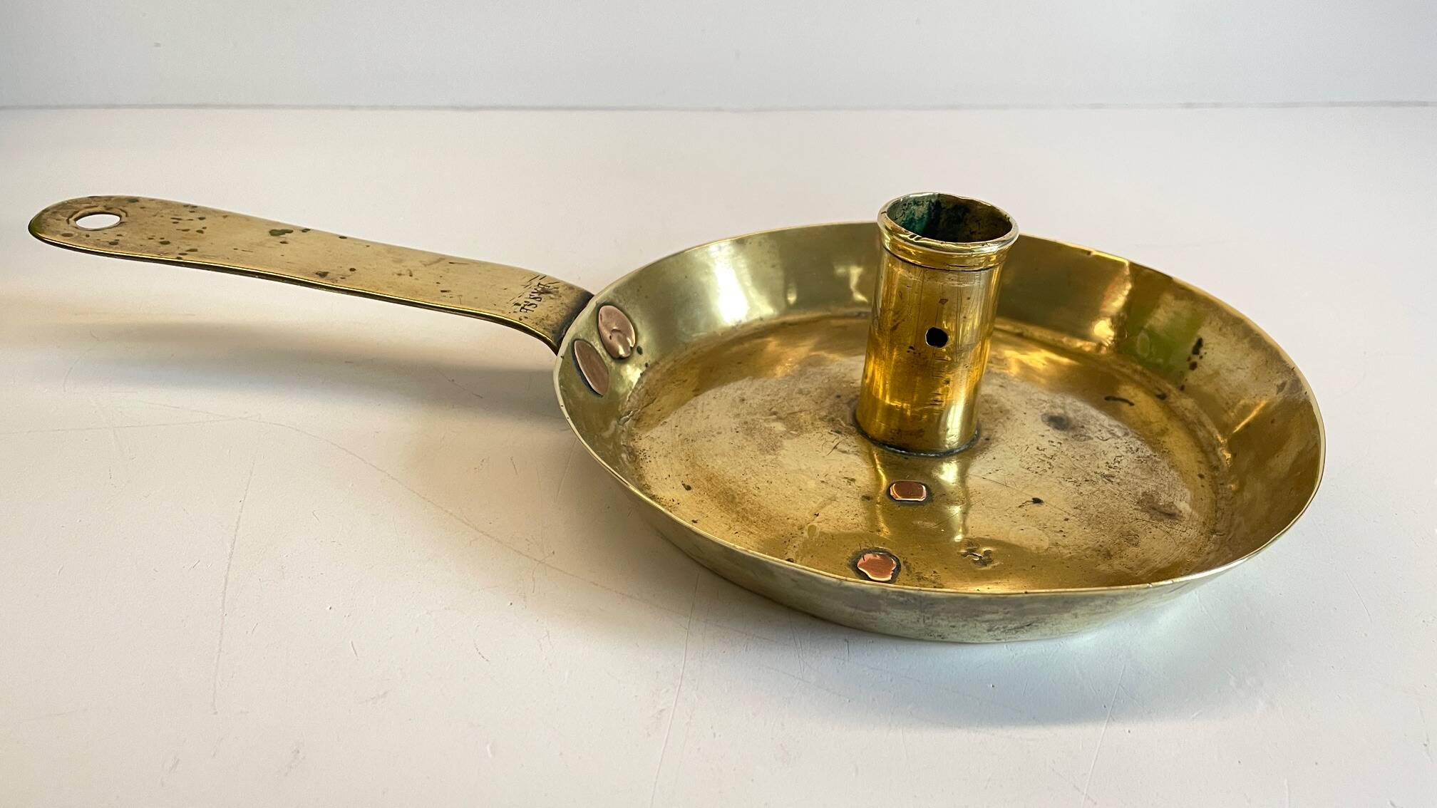 LOW HAND BRASS CANDLESTICK ANTIQUE