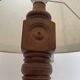 Brutalist floor lamp in turned wood, in the style of Charles Dudouyt.