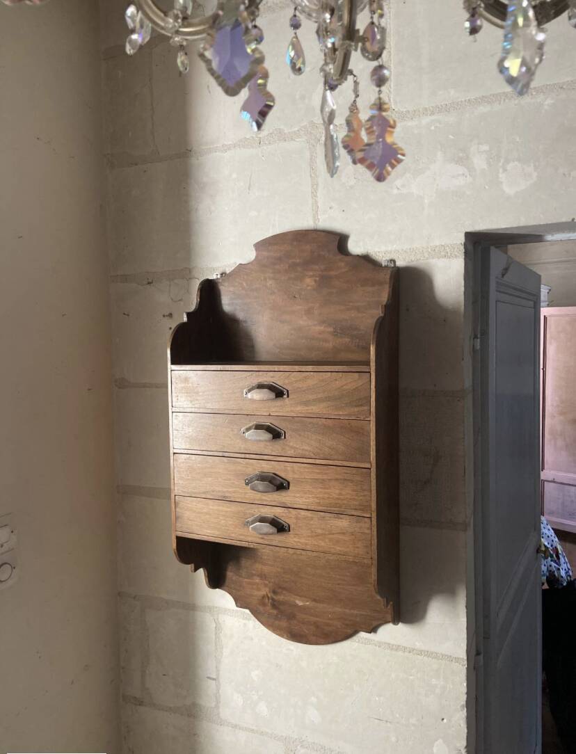 Antique piece of furniture with walnut drawers to hang