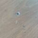 Tripod stool with a screw.