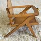 Chaise bébé aux pieds compas