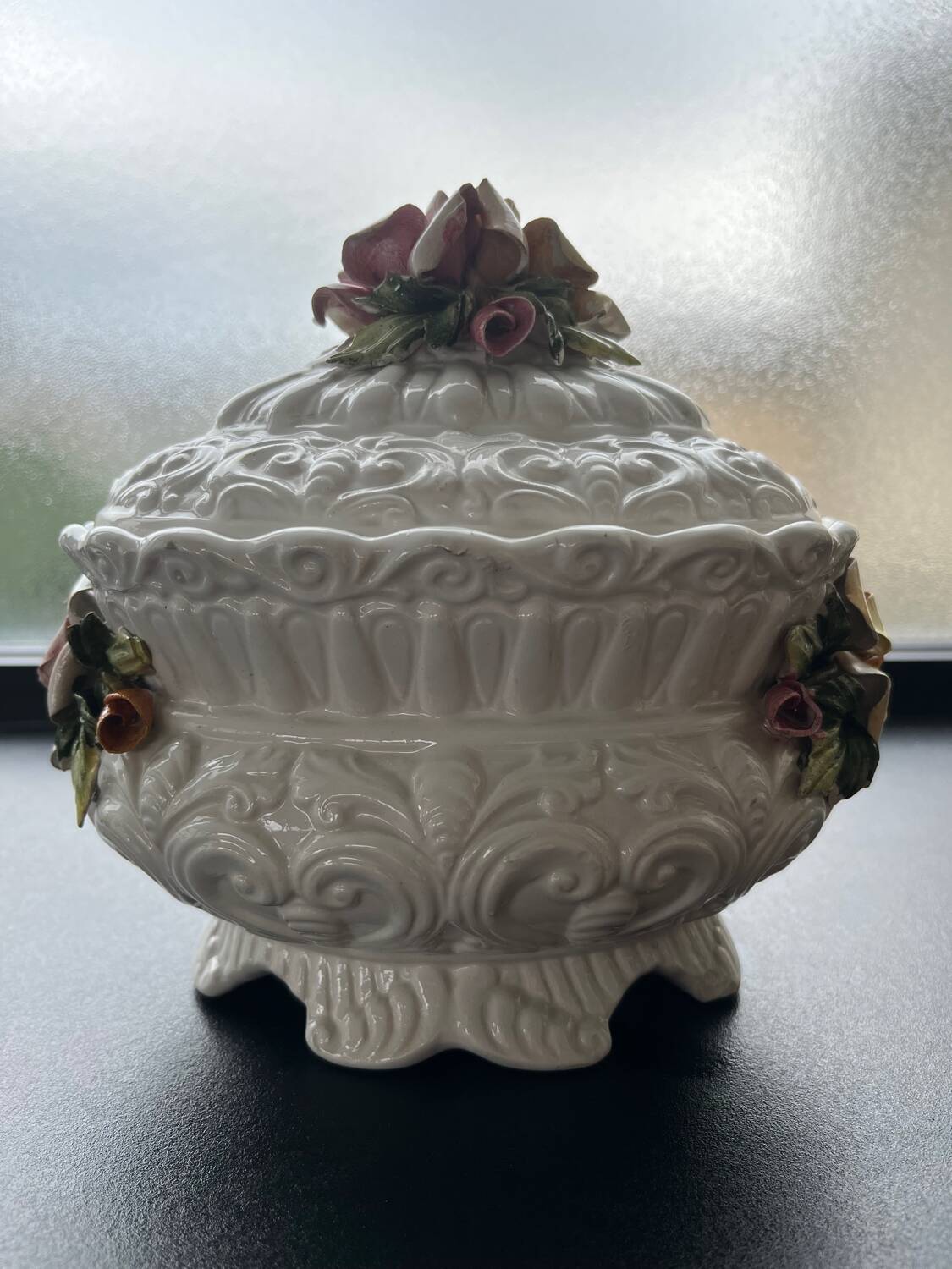 Capodimonte-style porcelain lidded sugar bowl with floral relief