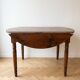 Antique dining table with drop leaves, wood.