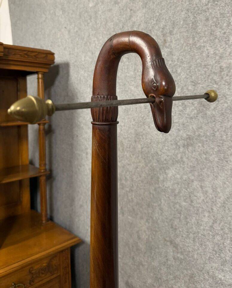 Empire style mahogany cradle with a swan neck, shaped like a cradle, circa 1810