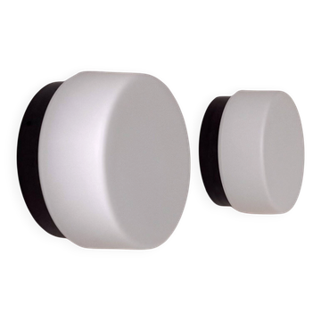Pair of vintage wall lights in black Bakelite and frosted opal glass, France 1970.