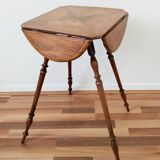 Side table, with flaps, in walnut, waxed finish and golden monogram, late 19th century