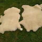 Two vintage sheepskins.