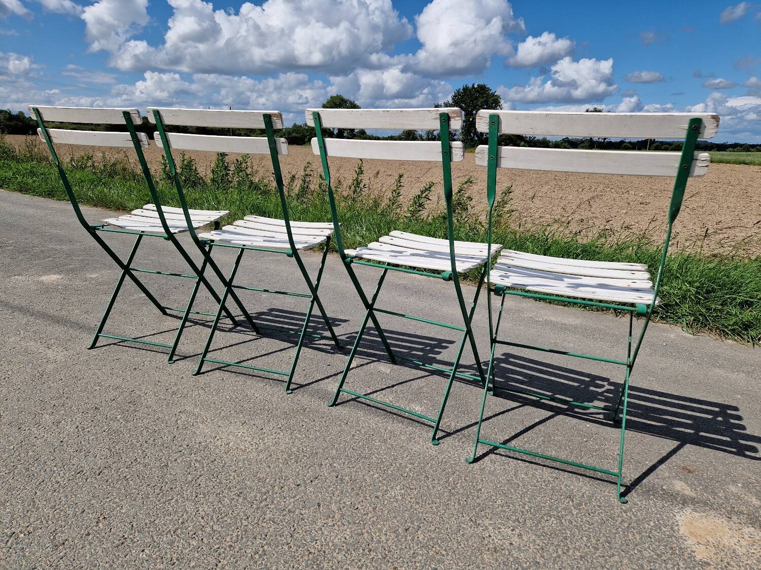 Set of 4 folding wrought iron bistro chairs