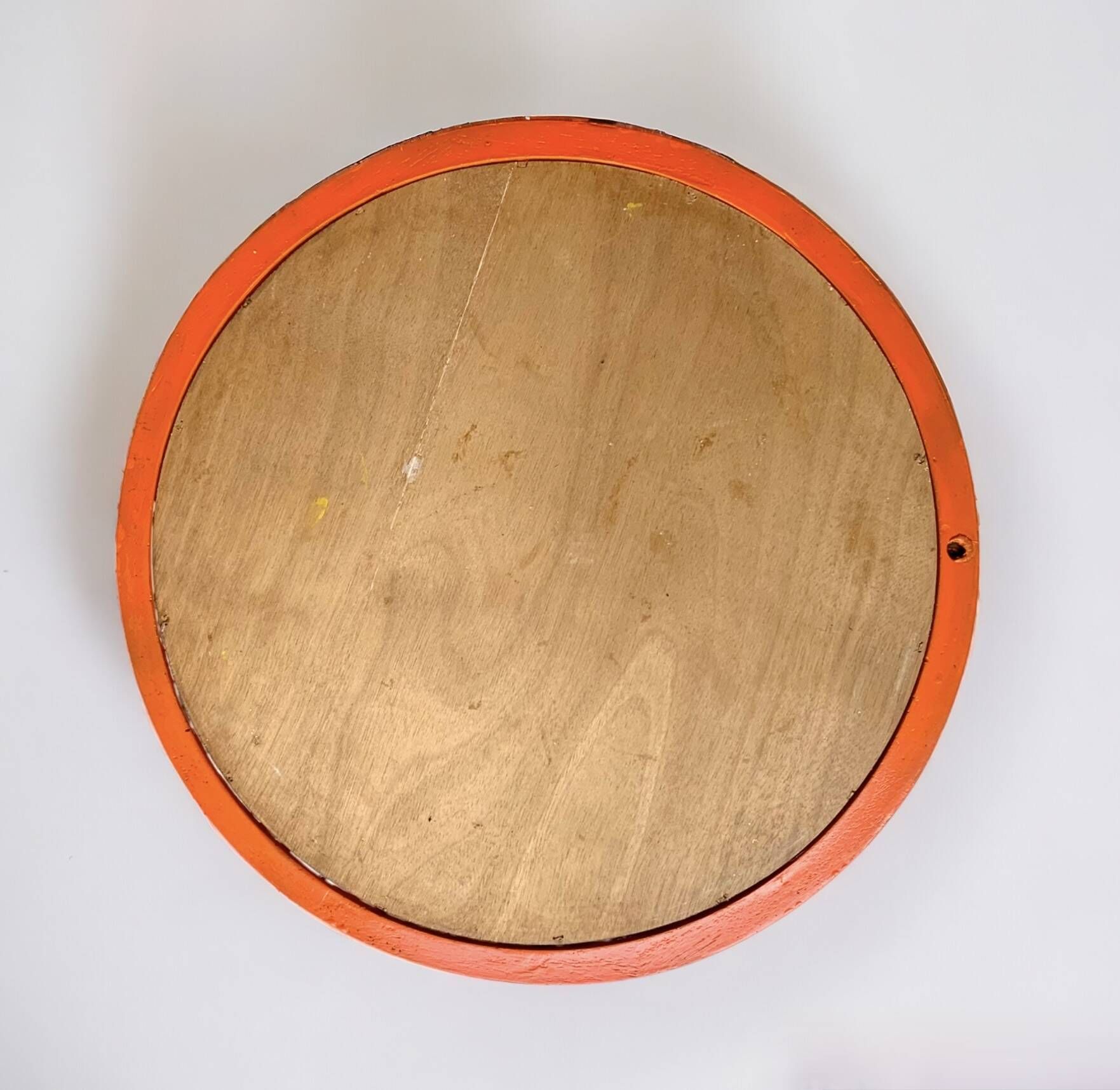 Vintage round wall mirror in orange painted wood - diameter: 48 cm