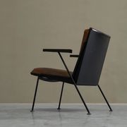 Modernist Dutch lounge chair in enamelled steel and leather from the 1950s.