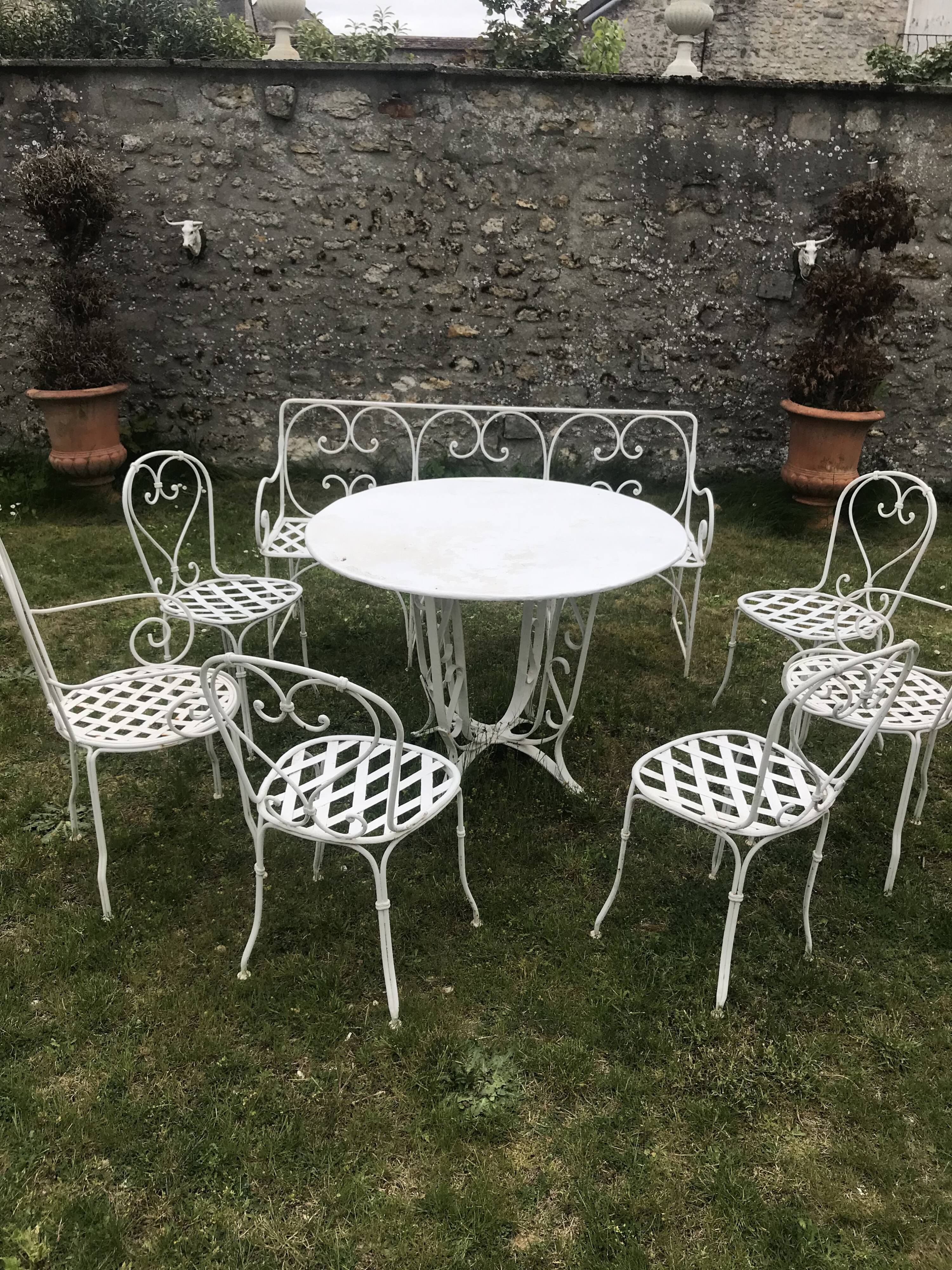Antique wrought iron garden furniture