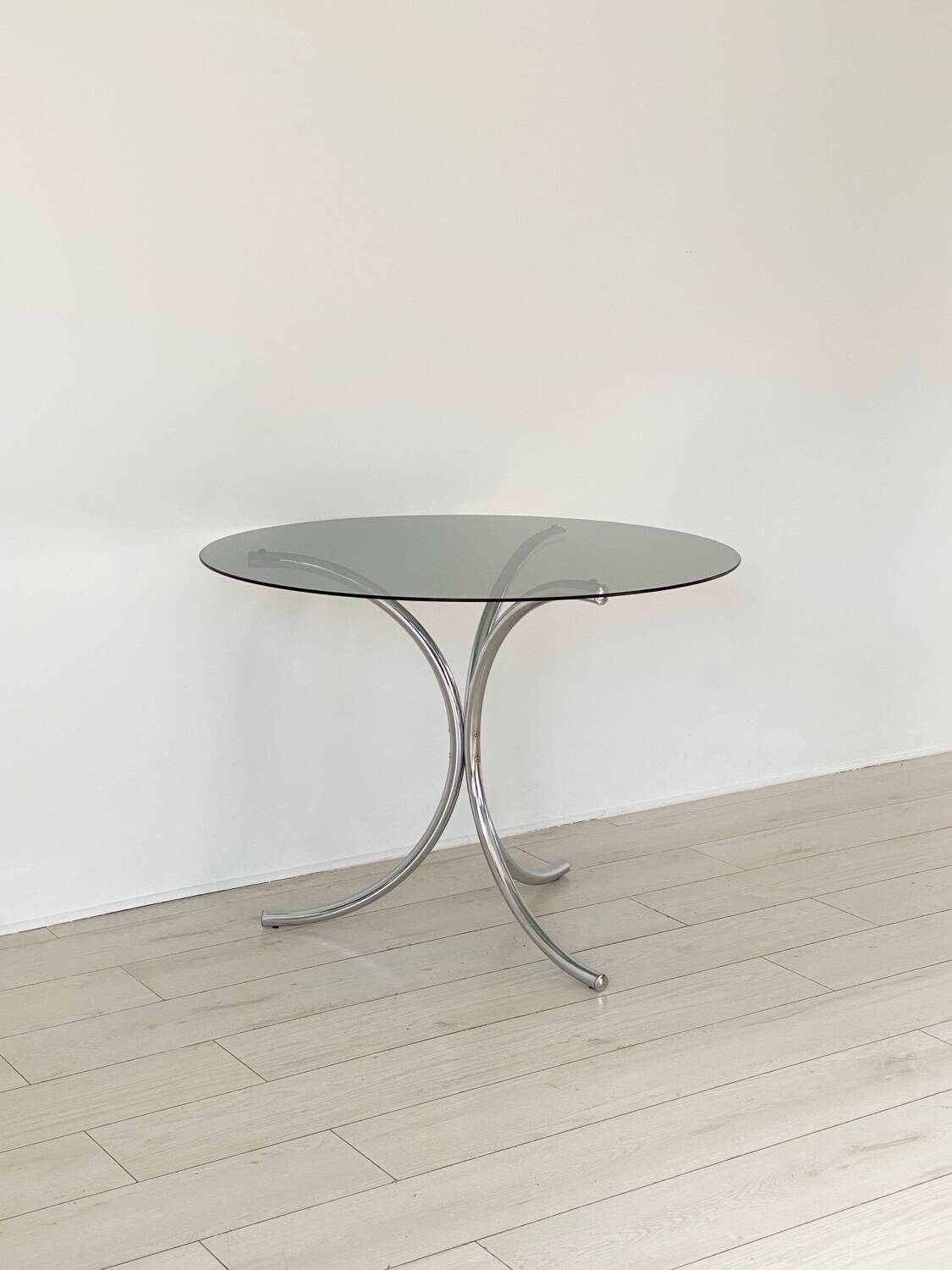 Table for 4 people in smoked glass and metal, 1970.