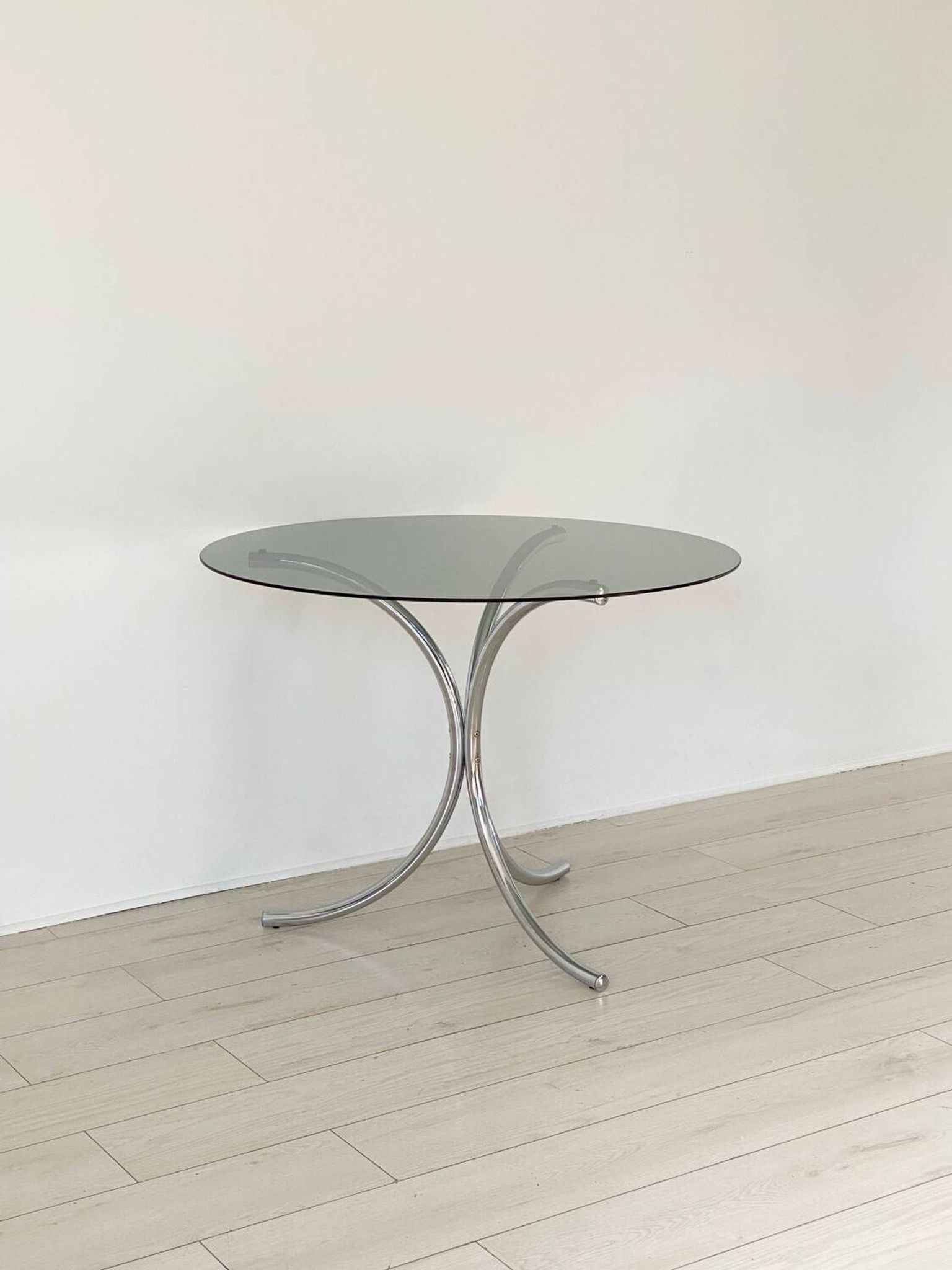 Table for 4 people in smoked glass and metal, 1970.