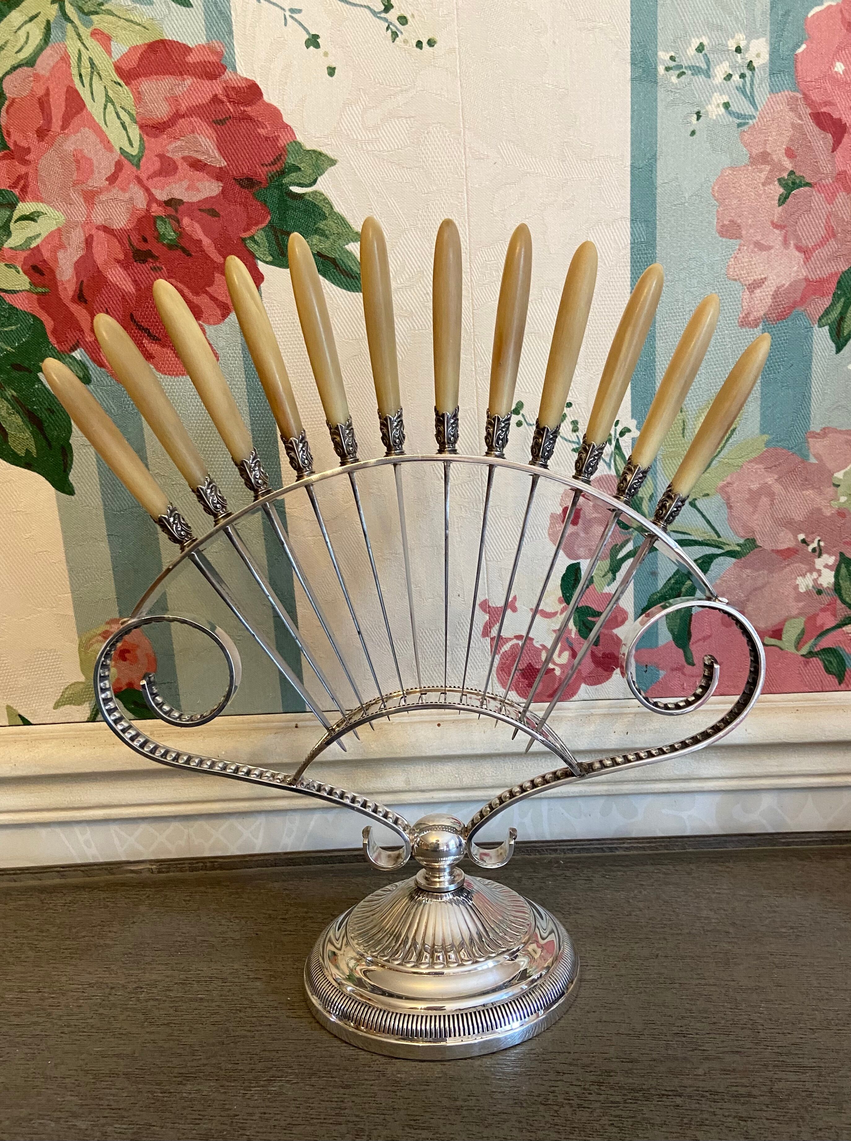 12 small antique knives and their fan knife holders