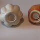 Pepper salt shaker in the shape of garlic and onion head