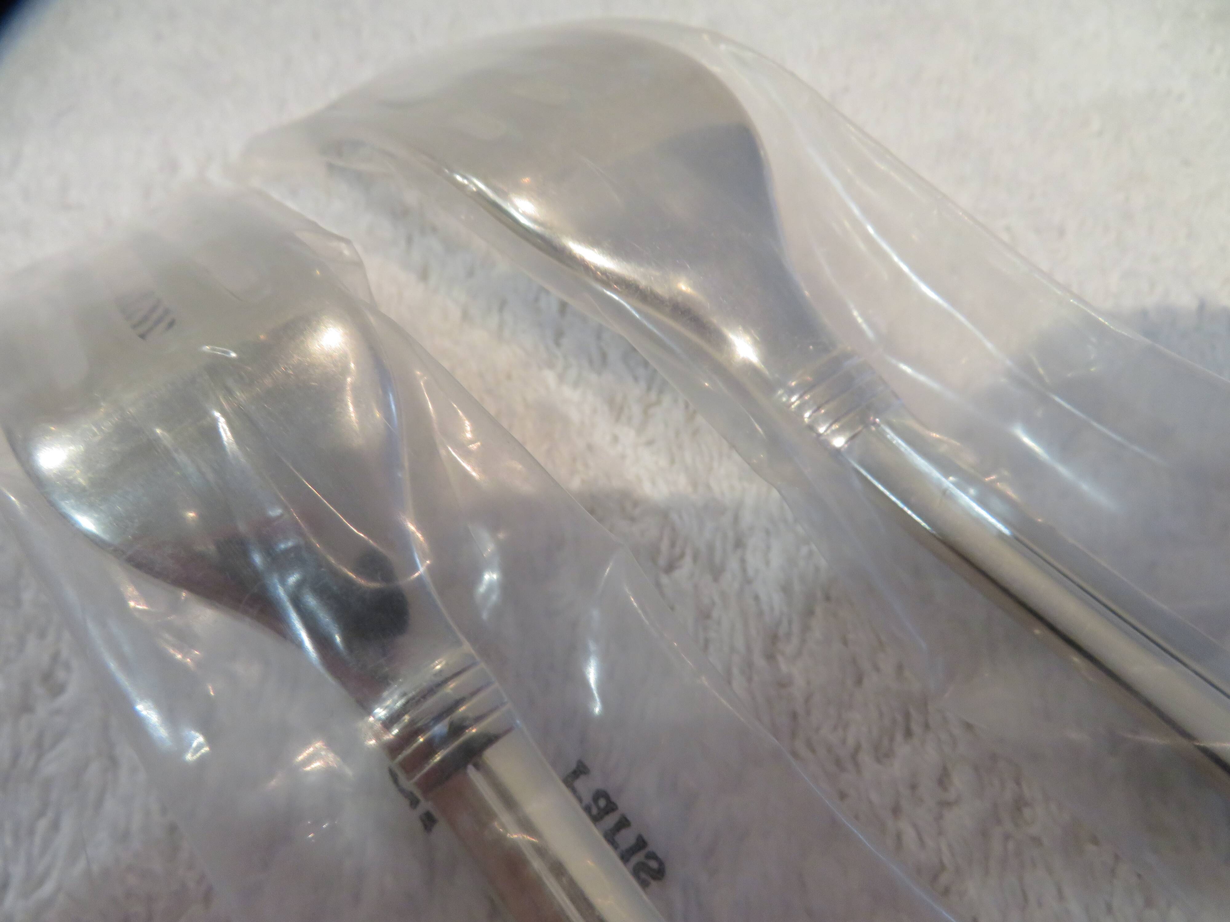 2 Christofle Atlantide silver-plated table forks in blister pack