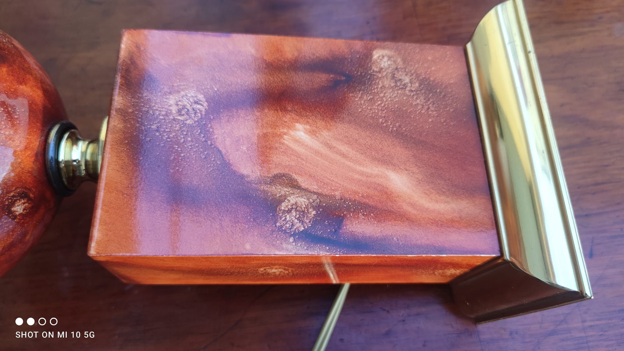 Lamp circa 1970 in iron and lacquered wood as well as bronze