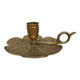 Brass candle holder on frame