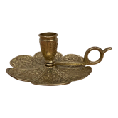 Brass candle holder on frame