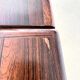 Rosewood dining table with integrated extensions — Denmark, 1960s