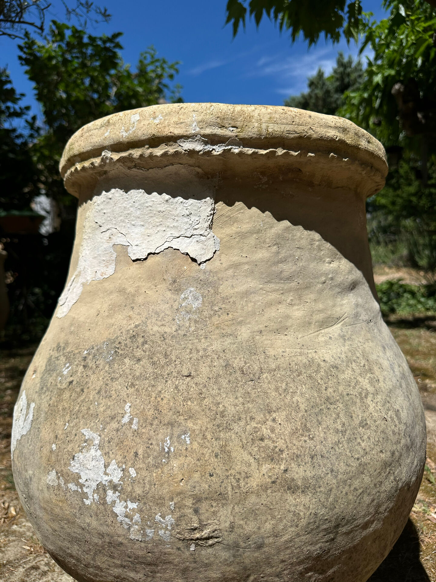 Ancient terracotta pottery jar
